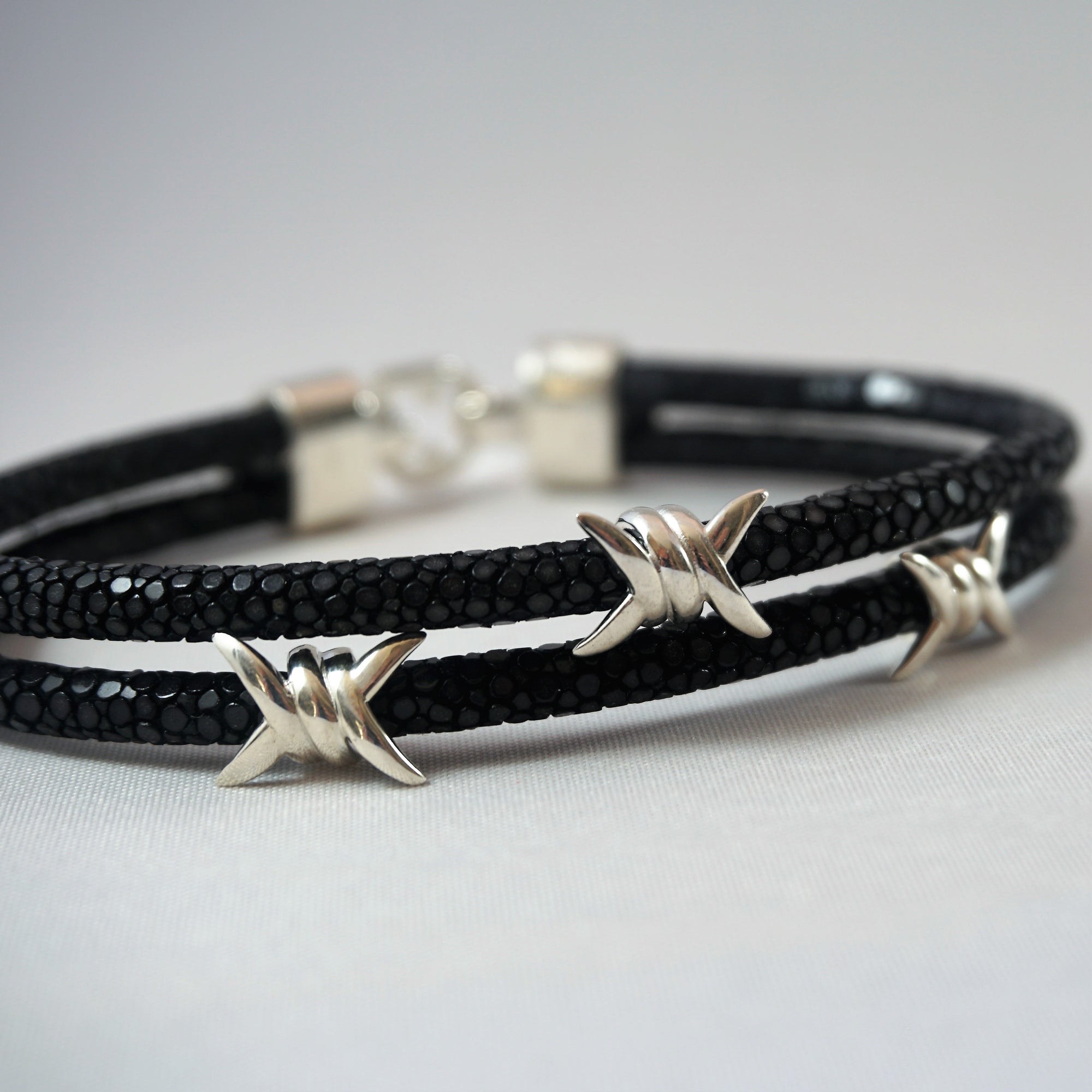 Black Stingray Bracelet with Pure Silver Barbwire Style Accent